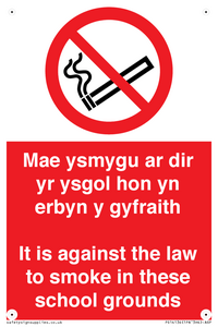 Mae ysmygu ar dir yr ysgol hon yn erbyn y gyfraith It is against the law to smoke in these school grounds - Bilingual Welsh / English